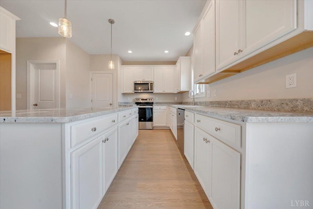 20 Elk Creel Rd, Forest, VA 24551 - kitchen with stainless steel appliances, light wood-type flooring, white cabinets, a sink, and recessed lighting