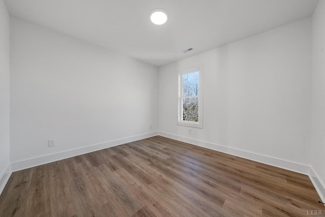 1197 Elk Creek Rd, Forest, VA 24551 - unfurnished room featuring wood finished floors and baseboards
