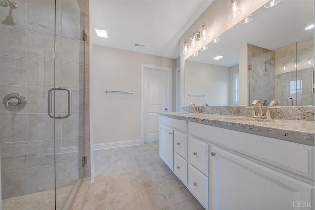 20 Elk Creel Rd, Forest, VA 24551 - bathroom featuring a stall shower, double vanity, baseboards, and tile patterned floors