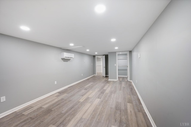 5822 Apache Ln, Lynchburg, VA 24503 - finished below grade area with a wall unit AC, recessed lighting, light wood finished floors, and baseboards