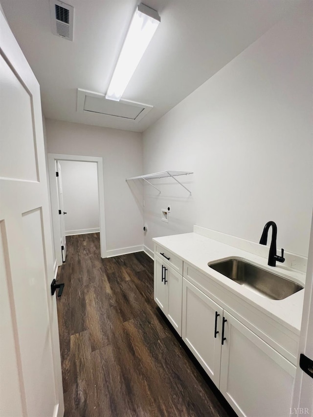 74 Lockridge Ln, Lynchburg, VA 24502 - washroom with hookup for a washing machine, cabinet space, attic access, dark wood-type flooring, and baseboards