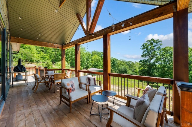 929 Poor House Farm Rd, Amherst, VA 24521 - deck featuring view of wooded area and outdoor dining area