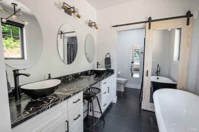 929 Poor House Farm Rd, Amherst, VA 24521 - full bath with double vanity, a soaking tub, and tile patterned floors