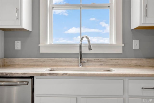 8638 Hat Creek Rd, Brookneal, VA 24528 - kitchen with dishwasher and white cabinets