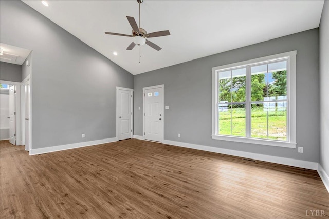 8638 Hat Creek Rd, Brookneal, VA 24528 - spare room featuring wood finished floors, a ceiling fan, high vaulted ceiling, and recessed lighting