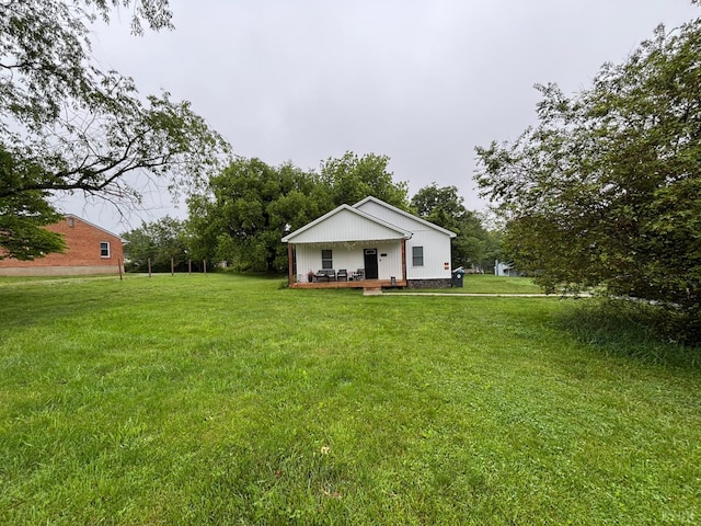 316 E Franklin St, Bedford, VA 24523 - view of green lawn with a wooden deck