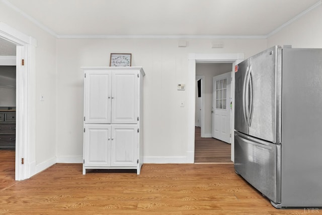 278 Tallyho, Concord, VA 24538 - kitchen featuring freestanding refrigerator, ornamental molding, baseboards, and light wood-style flooring