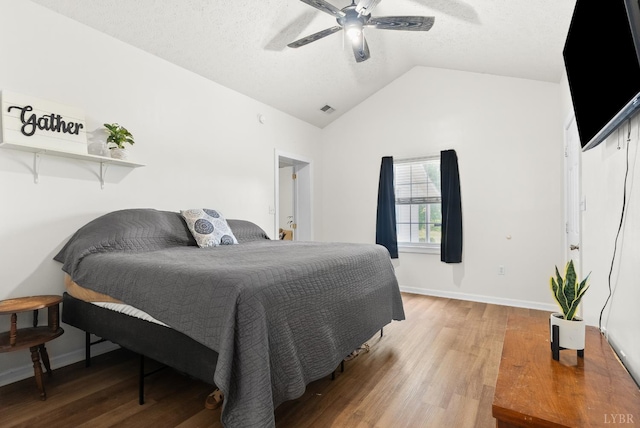 278 Tallyho, Concord, VA 24538 - bedroom featuring vaulted ceiling, light wood-type flooring, a ceiling fan, baseboards, and a textured ceiling