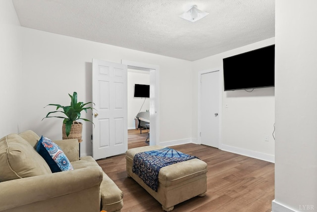 278 Tallyho, Concord, VA 24538 - living room with wood finished floors, a textured ceiling, and baseboards