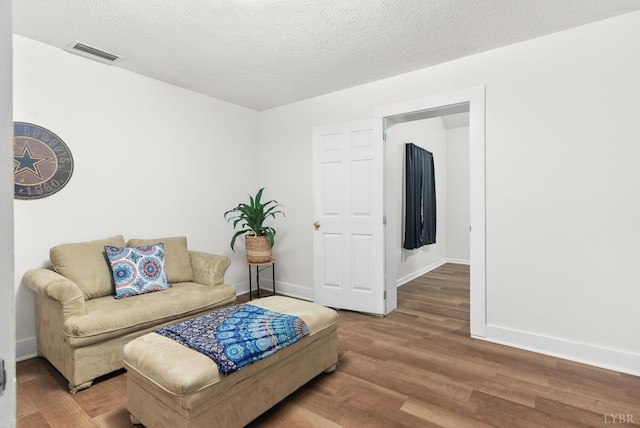 278 Tallyho, Concord, VA 24538 - living room featuring wood finished floors, baseboards, and a textured ceiling