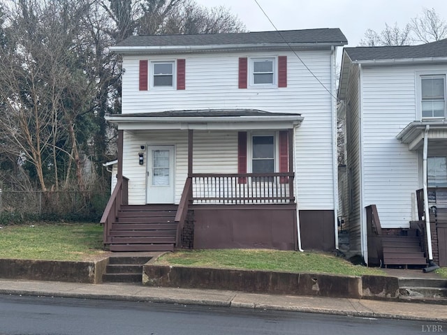 view of front of house with a porch and stairway