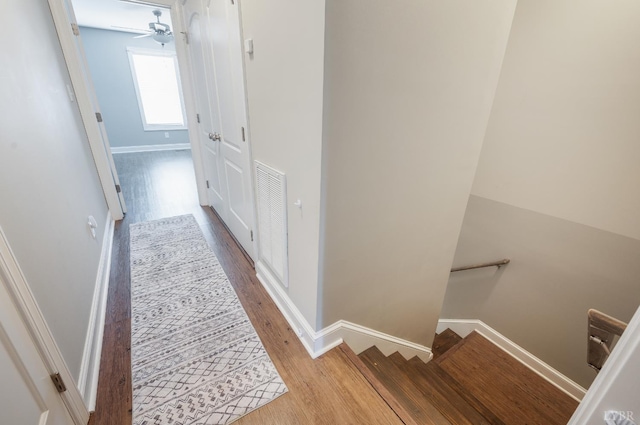 321 Meridian St, Lynchburg, VA 24502 - hall with an upstairs landing, wood finished floors, and baseboards