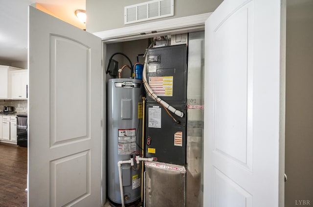 321 Meridian St, Lynchburg, VA 24502 - utility room featuring electric water heater