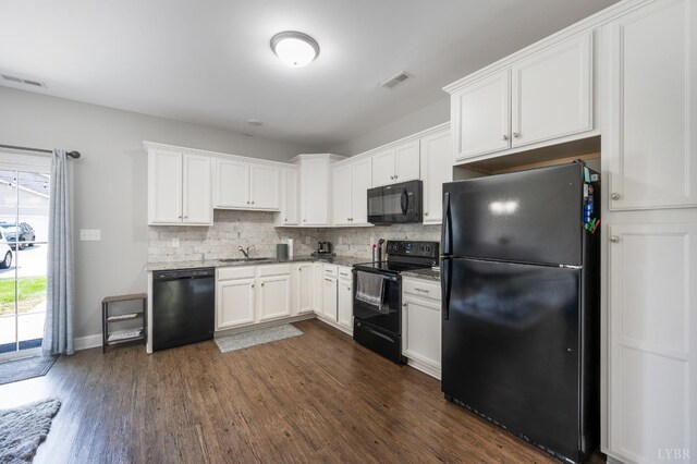 321 Meridian St, Lynchburg, VA 24502 - kitchen featuring black appliances, a sink, tasteful backsplash, dark wood-style flooring, and white cabinets
