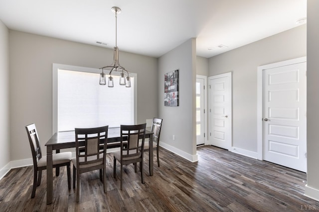 64 Allwell Rd, Lynchburg, VA 24502 - dining room with dark wood-style floors, baseboards, and a chandelier