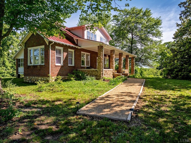 264 N Five Forks Rd, Amherst, VA 24521 - view of front facade featuring a front lawn, a standing seam roof, metal roof, and brick siding