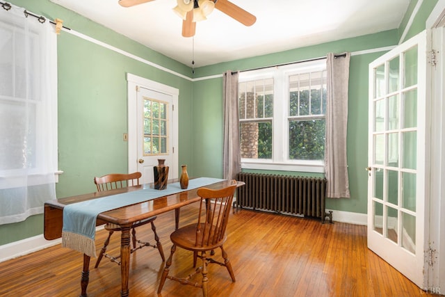 264 N Five Forks Rd, Amherst, VA 24521 - dining space featuring radiator, a ceiling fan, baseboards, and hardwood / wood-style floors