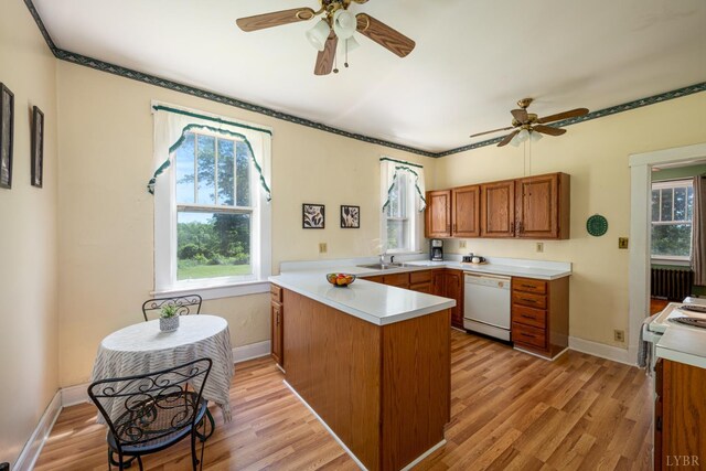 264 N Five Forks Rd, Amherst, VA 24521 - kitchen featuring dishwasher, a peninsula, a ceiling fan, and brown cabinetry