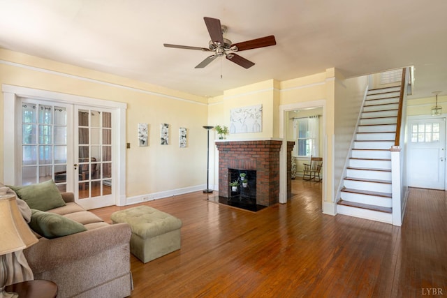 264 N Five Forks Rd, Amherst, VA 24521 - living room featuring stairway, wood finished floors, a ceiling fan, and baseboards