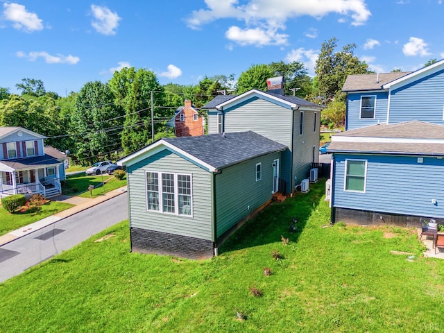 722 Polk St, Lynchburg, VA 24504 - view of side of property with a yard