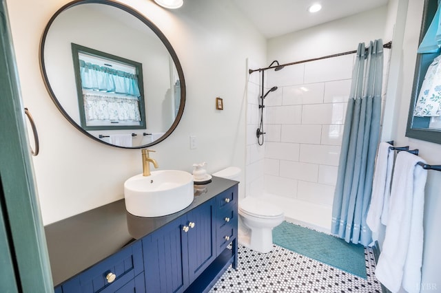 722 Polk St, Lynchburg, VA 24504 - bathroom featuring vanity, toilet, tiled shower, and recessed lighting