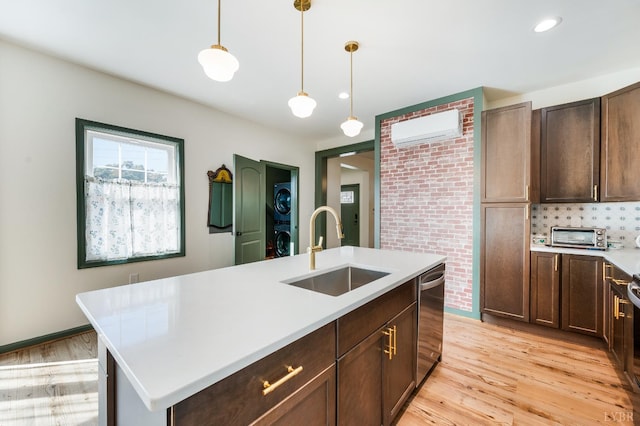 722 Polk St, Lynchburg, VA 24504 - kitchen featuring a sink, a wall mounted air conditioner, dishwasher, light countertops, and light wood-style flooring