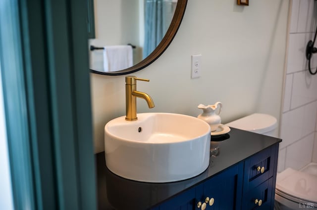 722 Polk St, Lynchburg, VA 24504 - bathroom featuring toilet, a shower, and vanity