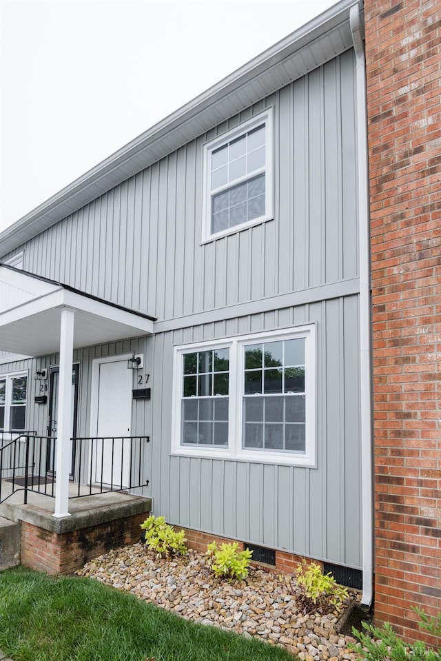 3501 Fort Ave Unit 27, Lynchburg, VA 24501 - view of front of home featuring a porch, board and batten siding, and crawl space