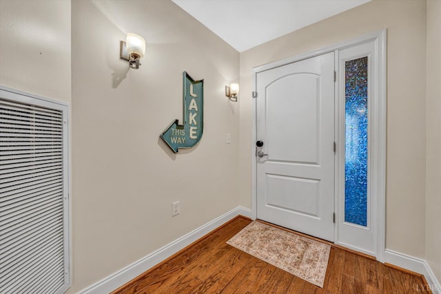 100 Bridgewater Pointe Pl Unit 401, Moneta, VA 24121 - foyer entrance with wood finished floors, baseboards, and a heating unit