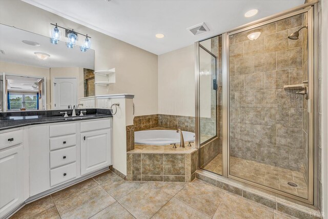 100 Bridgewater Pointe Pl Unit 401, Moneta, VA 24121 - full bathroom with vanity, a bath, a stall shower, and tile patterned floors