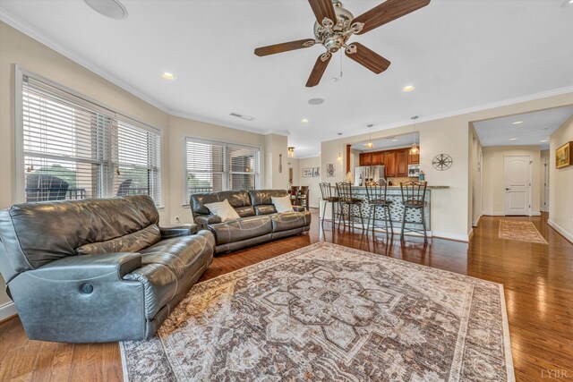 100 Bridgewater Pointe Pl Unit 401, Moneta, VA 24121 - living room featuring a ceiling fan, wood finished floors, crown molding, baseboards, and recessed lighting