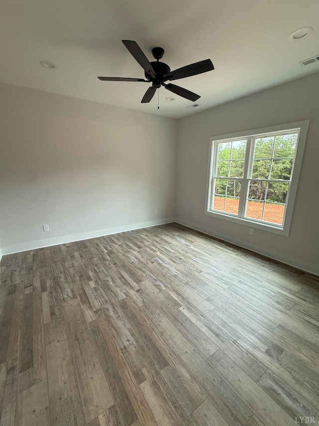 451 Dearborn Rd, Evington, VA 24550 - unfurnished room featuring hardwood / wood-style flooring, a ceiling fan, and baseboards