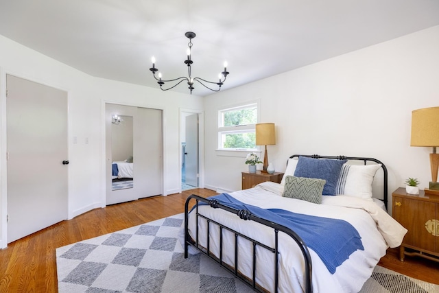 1261 Krise Cir, Lynchburg, VA 24503 - bedroom with a chandelier, wood finished floors, and baseboards