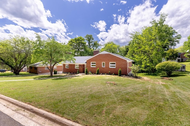 1261 Krise Cir, Lynchburg, VA 24503 - view of property exterior featuring brick siding, a yard, and a chimney