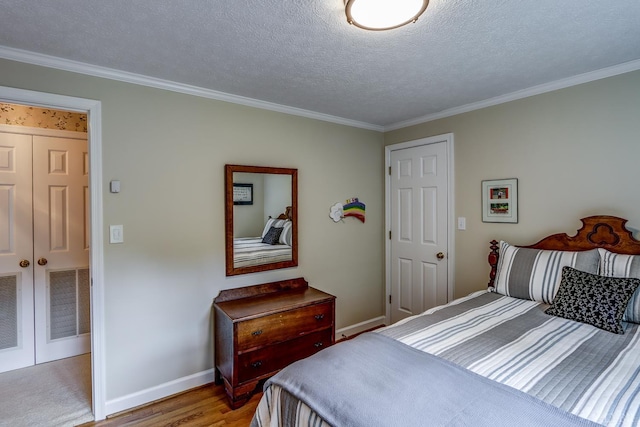 1146 Audubon Dr, Lynchburg, VA 24503 - bedroom with baseboards, crown molding, wood finished floors, and a textured ceiling