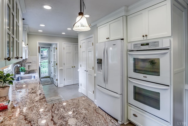 1146 Audubon Dr, Lynchburg, VA 24503 - kitchen featuring white appliances, a sink, ornamental molding, light stone countertops, and glass insert cabinets