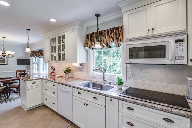 1146 Audubon Dr, Lynchburg, VA 24503 - kitchen featuring white appliances, a sink, ornamental molding, a peninsula, and white cabinets