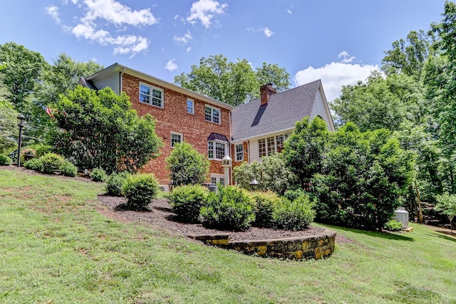 1146 Audubon Dr, Lynchburg, VA 24503 - rear view of property with brick siding, a lawn, and a chimney