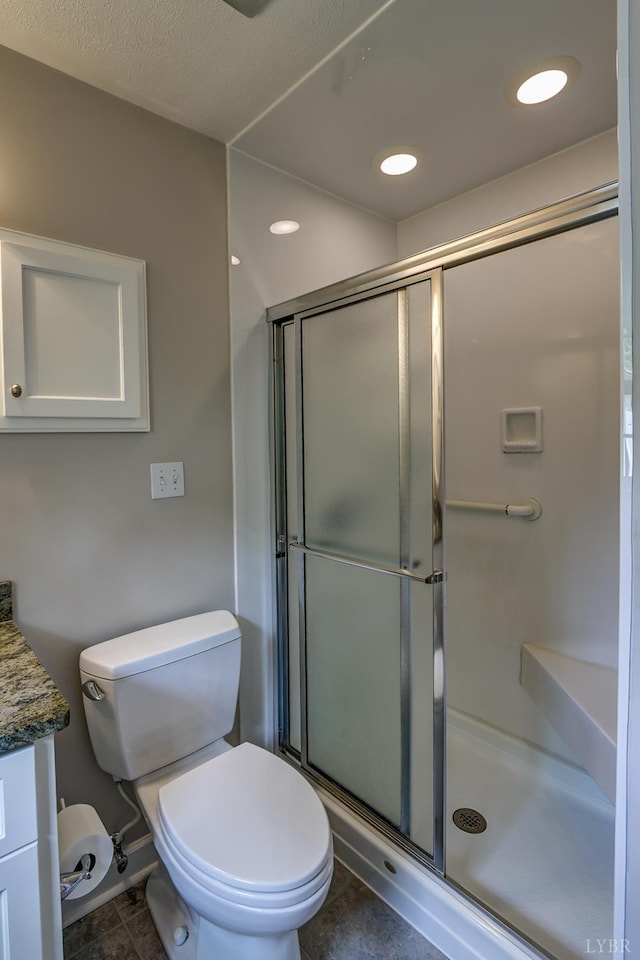 1146 Audubon Dr, Lynchburg, VA 24503 - bathroom featuring toilet, a stall shower, vanity, and tile patterned flooring