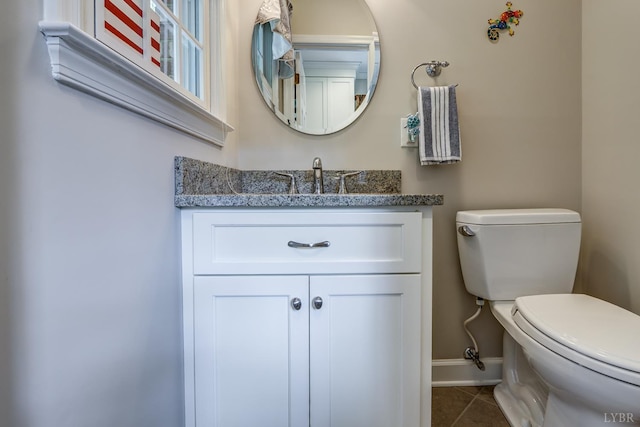 1146 Audubon Dr, Lynchburg, VA 24503 - bathroom featuring toilet, vanity, baseboards, and tile patterned floors