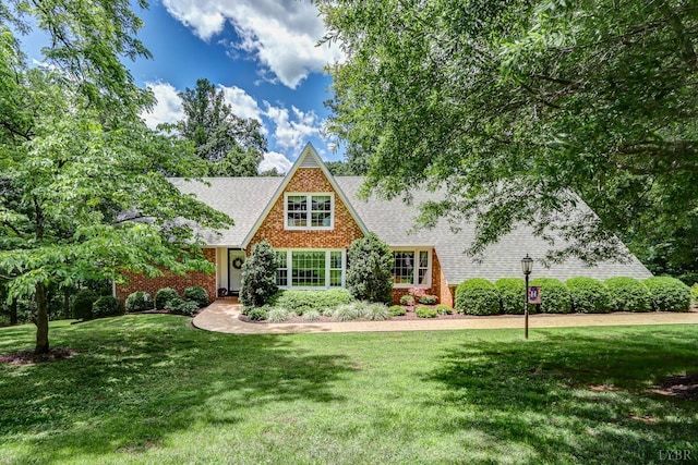 1146 Audubon Dr, Lynchburg, VA 24503 - view of front of property featuring roof with shingles, a front yard, and brick siding