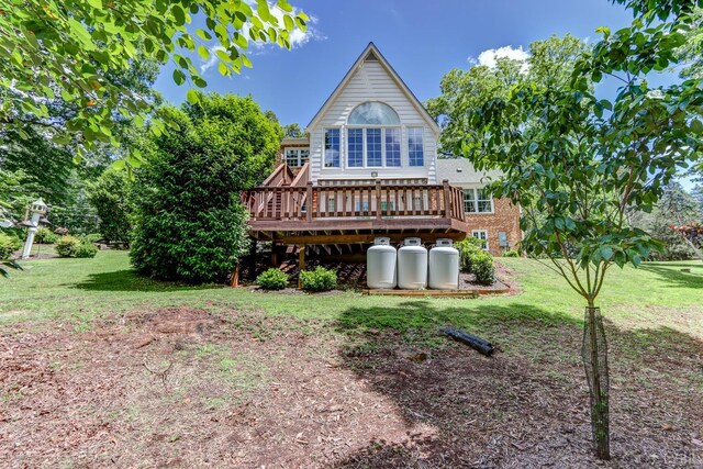 1146 Audubon Dr, Lynchburg, VA 24503 - back of property featuring a wooden deck, a lawn, and brick siding