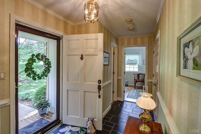 1146 Audubon Dr, Lynchburg, VA 24503 - entryway with wallpapered walls, a chandelier, and ornamental molding