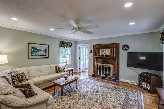 1146 Audubon Dr, Lynchburg, VA 24503 - living room with ornamental molding, wood finished floors, recessed lighting, ceiling fan, and baseboards