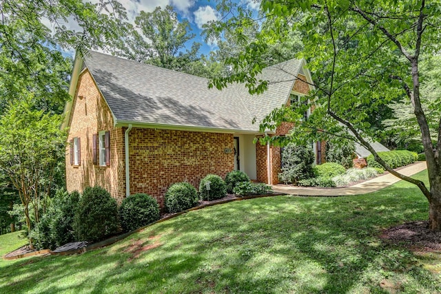 1146 Audubon Dr, Lynchburg, VA 24503 - view of front facade with brick siding, roof with shingles, and a front lawn