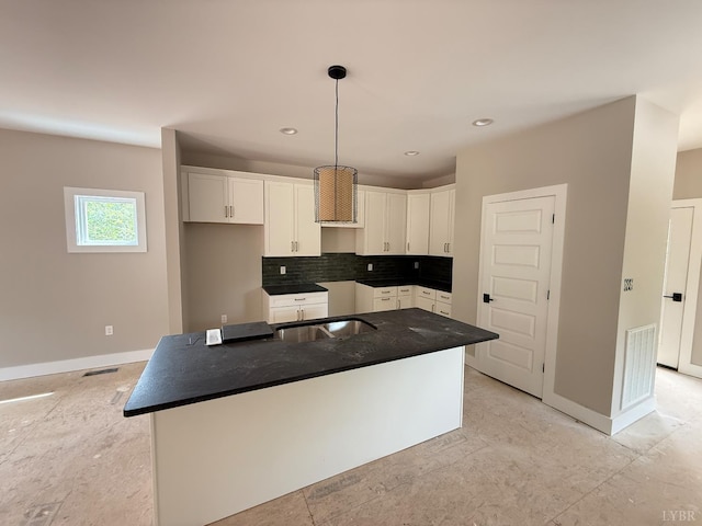 17 Kershaw Dr, Rustburg, VA 24588 - kitchen featuring dark countertops, white cabinetry, a kitchen island, and recessed lighting