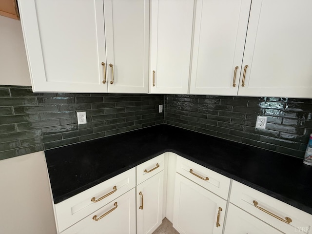 17 Kershaw Dr, Rustburg, VA 24588 - kitchen with white cabinetry, backsplash, and dark countertops