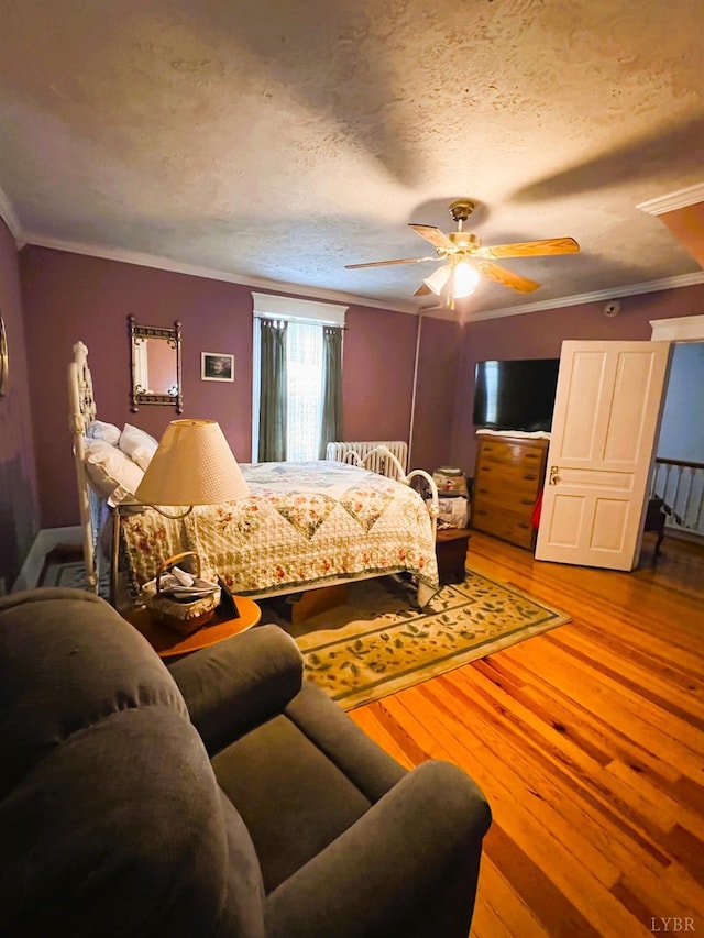 901 Bedford Ave, Altavista, VA 24517 - bedroom with ornamental molding, wood finished floors, and ceiling fan