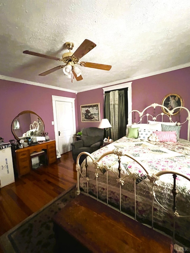 901 Bedford Ave, Altavista, VA 24517 - bedroom with wood finished floors, ornamental molding, a textured ceiling, and ceiling fan