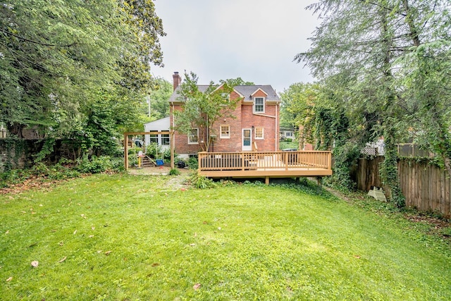 213 Kensington Ave, Lynchburg, VA 24503 - back of property with brick siding, a chimney, and a deck